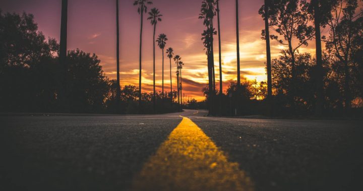 road in city during sunset